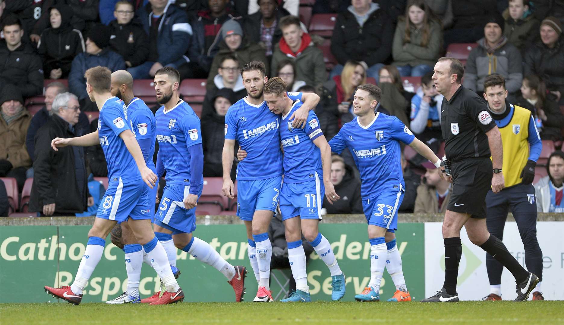 Luke O'Neill among those congratulating former captain Lee Martin after his goal against Scunthorpe United last season, in a 3-1 win Picture: Ady Kerry