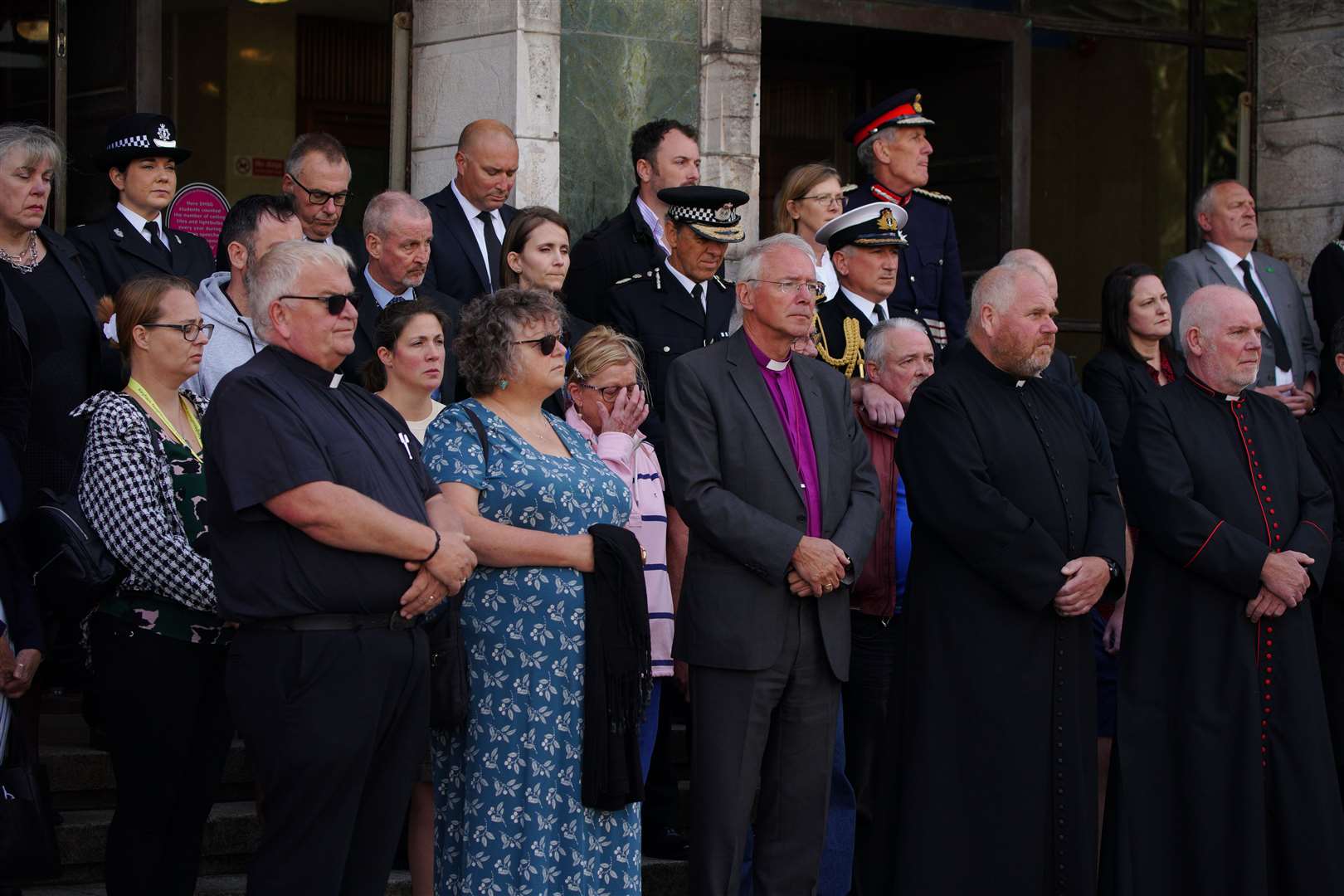 People gathered outside the Guildhall in Plymouth city centre (Ben Birchall/PA)