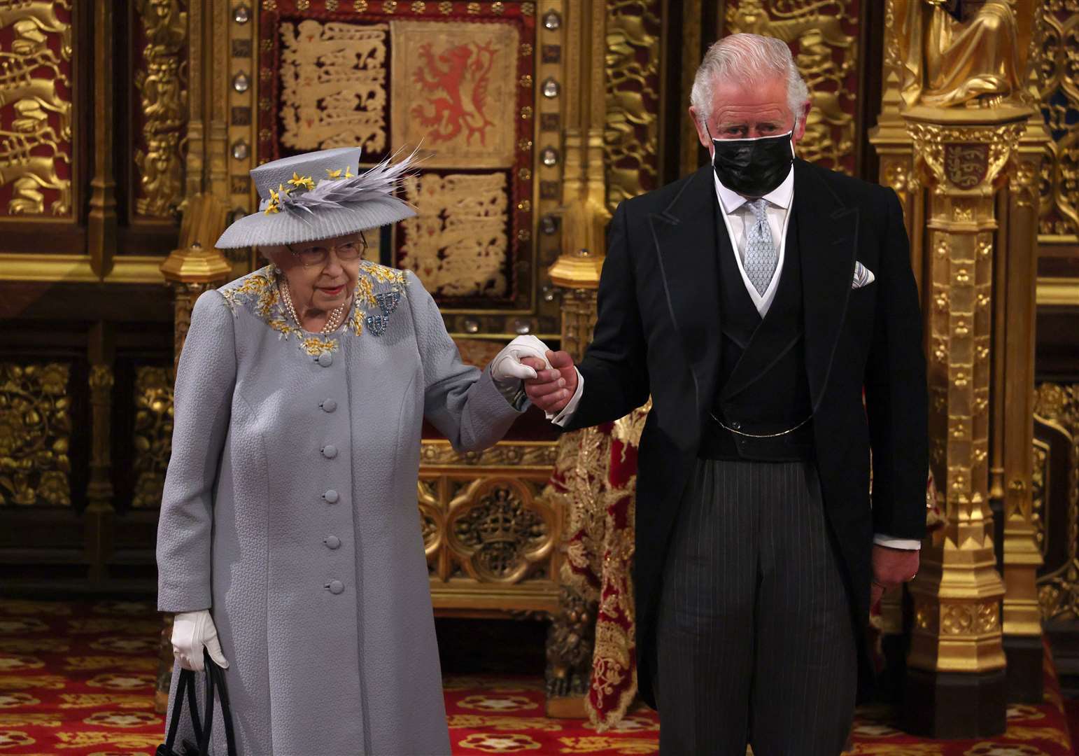 The Queen with Charles after she delivered the speech (Chris Jackson/PA)