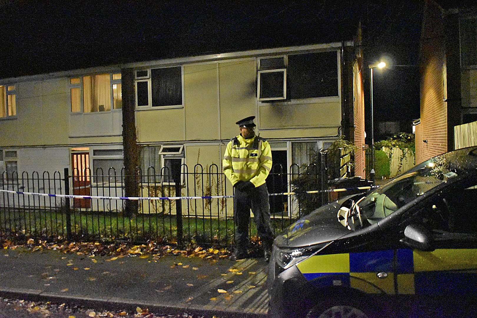 Police at the fire scene on Sunday (Matthew Cooper/PA)