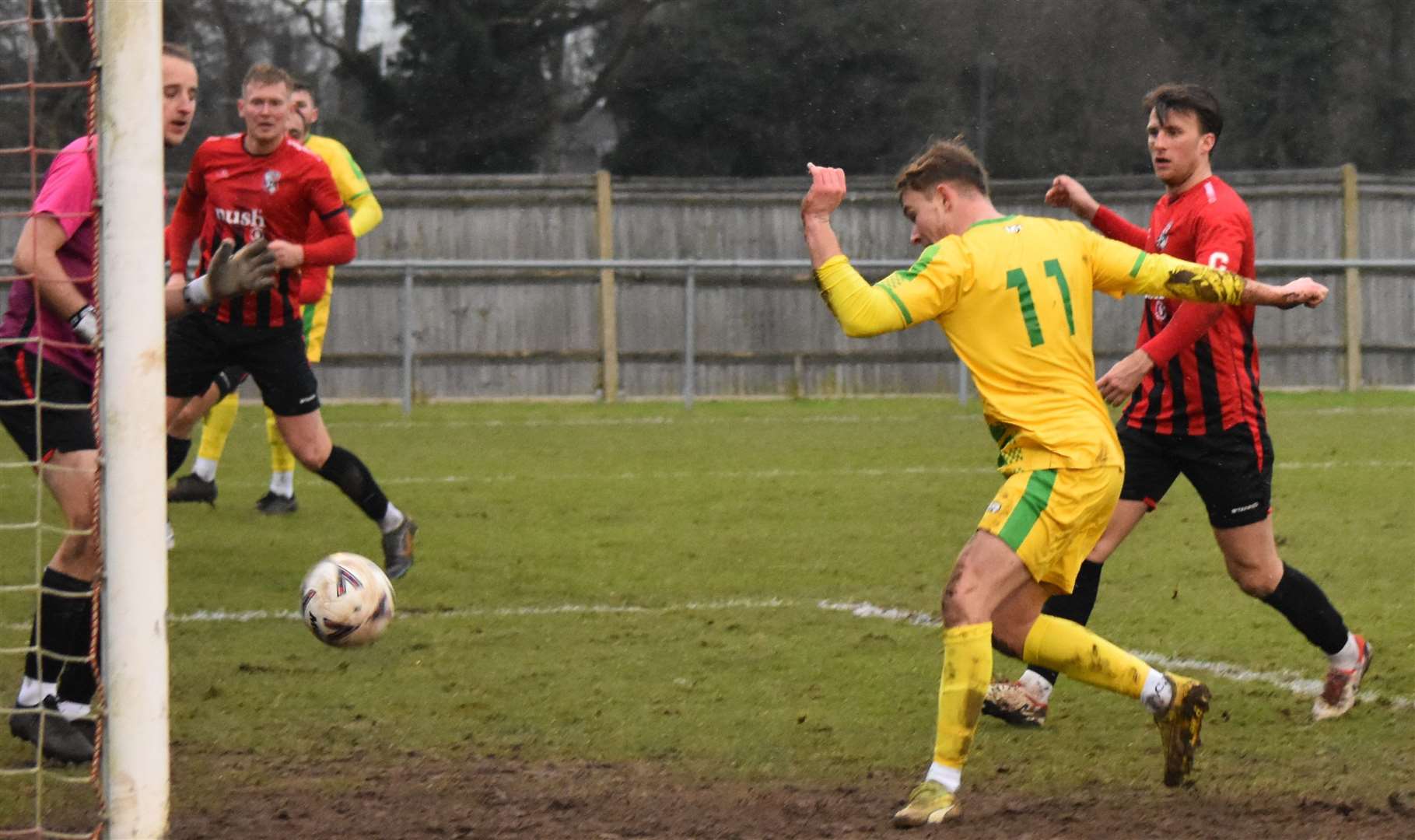 Will Dempsey gets Lydd's third goal at Glebe. Picture: Alan Coomes