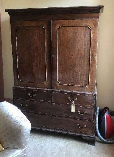 This George III-era linen press was also taken