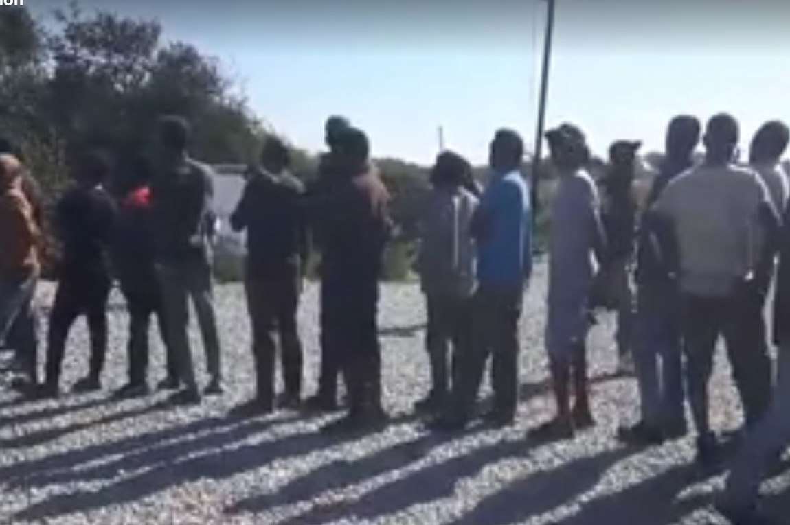 A food queue at the now-closed Jungle camp, Calais, September 2016