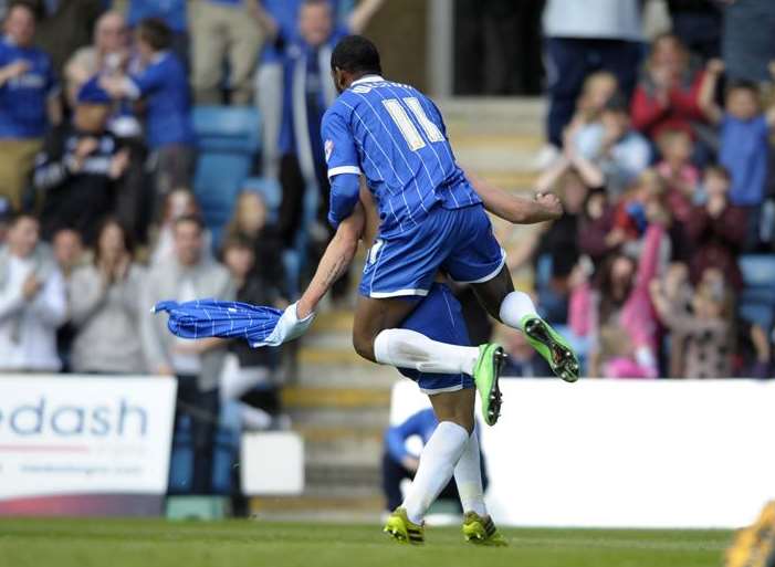 Myles Weston celebrates with goalscorer Bradley Dack Pic: Barry Goodwin