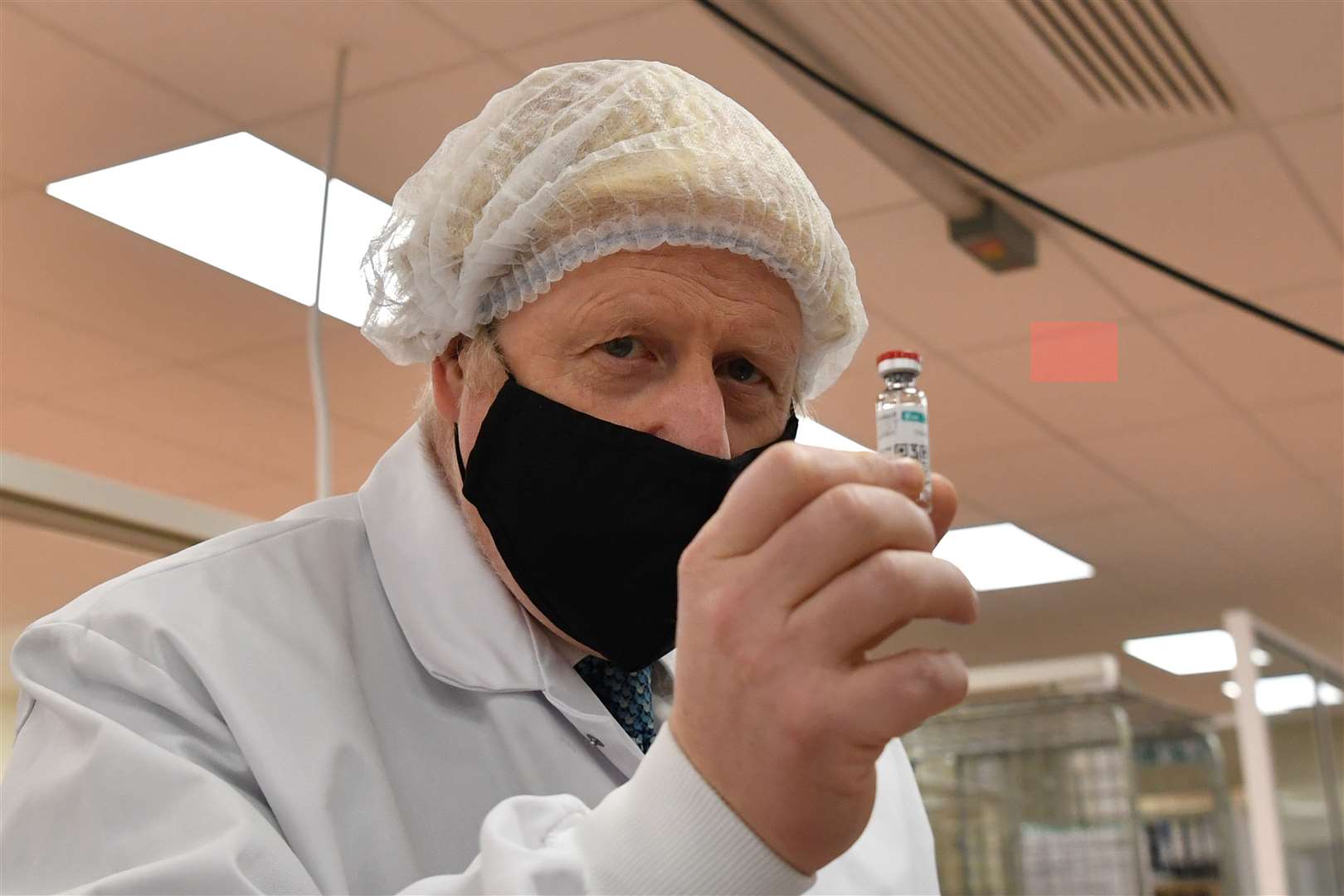 Prime Minister Boris Johnson during a visit to Wockhardt’s pharmaceutical manufacturing facility in Wrexham last year (Paul Ellis/PA)