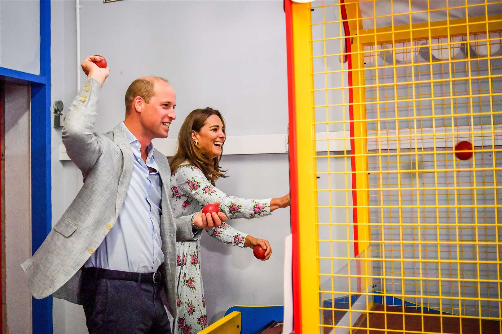 Fun and games for the duke and duchess at the arcade (Ben Birchall/PA)