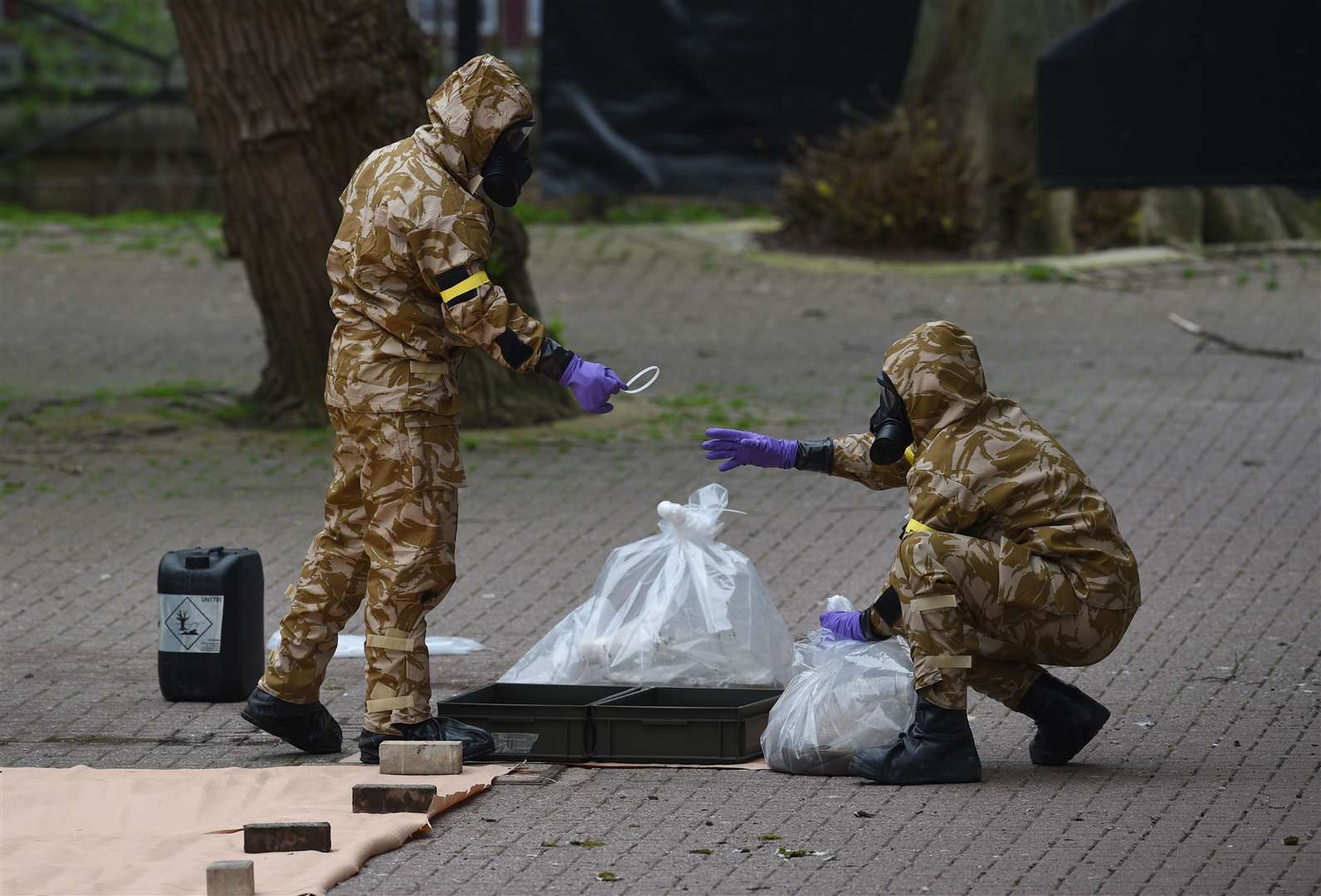 Military personnel at the site near the Maltings in Salisbury where Sergei and Yulia Skripal were poisoned (Ben Birchall/PA)