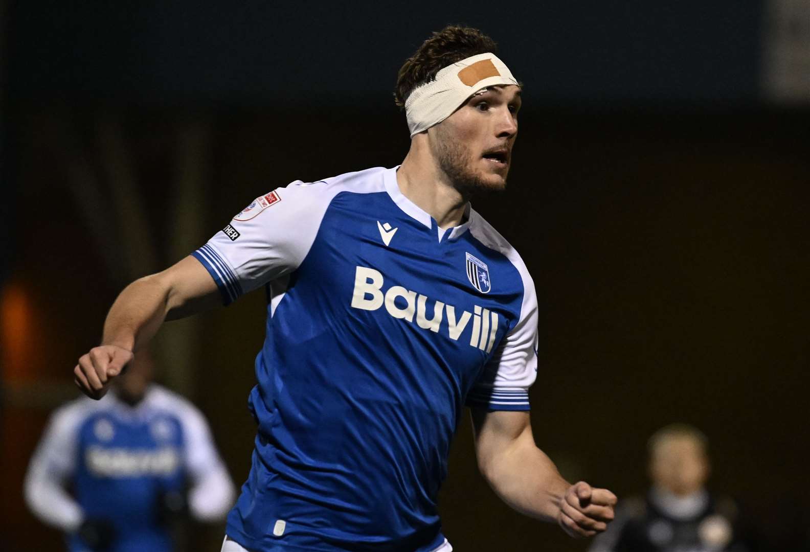 Josh Andrews suffered a head injury in the opening minute of the game against Bromley – Gillingham’s last competitive game Picture: Barry Goodwin