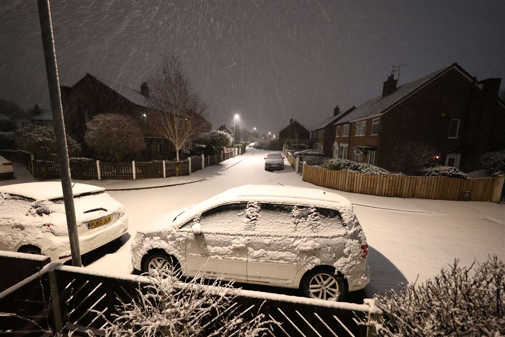 Overnight snow covers cars in Leeds (Danny Lawson/PA)