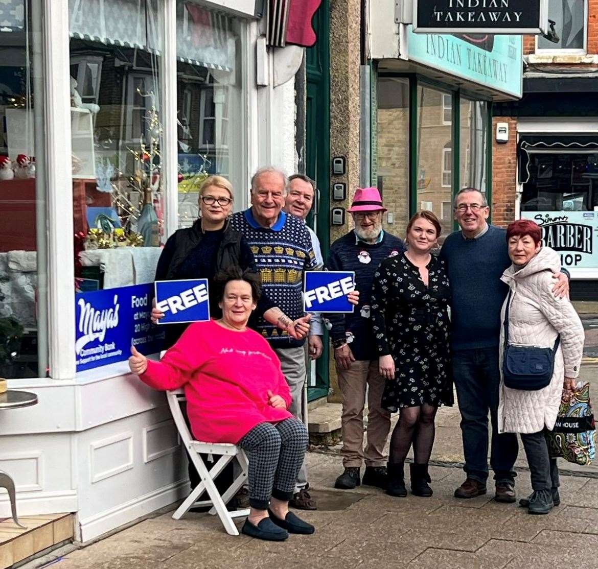 Maya Amangeldiyeva (standing left) and her team outside Maya’s Free Shop. Picture: Maya Amangeldiyeva