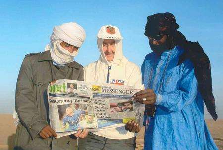 Jack Denness checks out his favourite paper ... in the desert