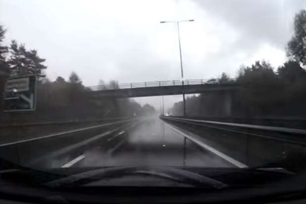 Car travels along the A2 towards Canterbury. Raw Cut Archive