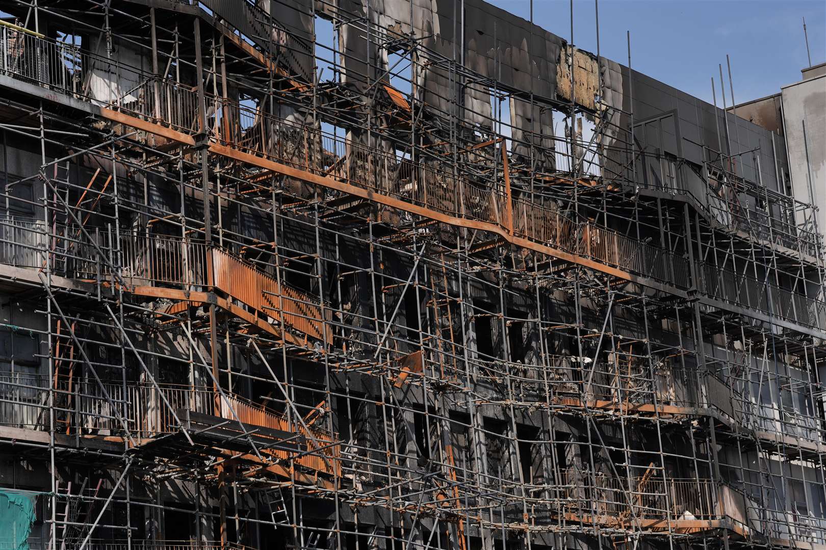 The building was covered in scaffolding when the fire broke out (Stefan Rousseau/PA)