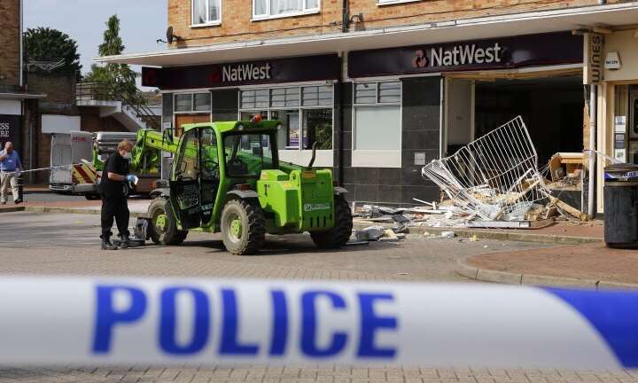 Police set up a cordon around the bank