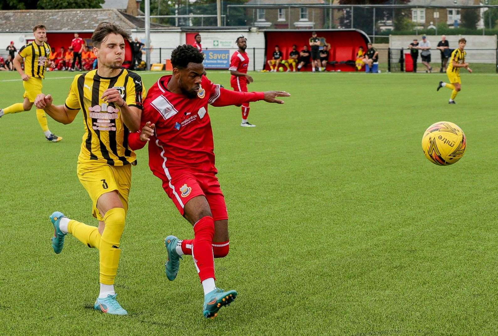 Whitstable's Josh Williams holds off Ed Sata. Picture: Les Biggs