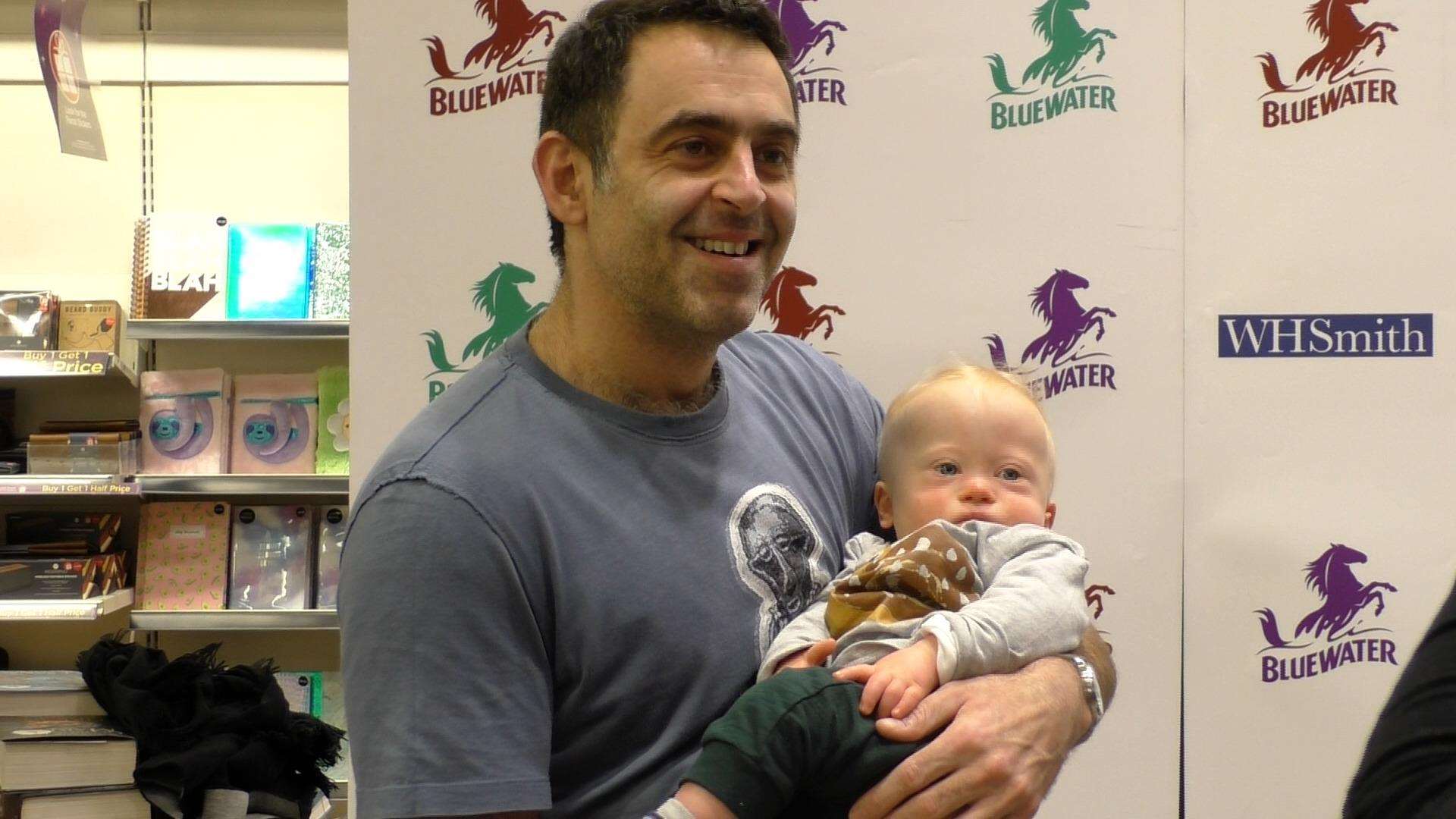 Ronnie O'Sullivan also met a young fan at the book signing