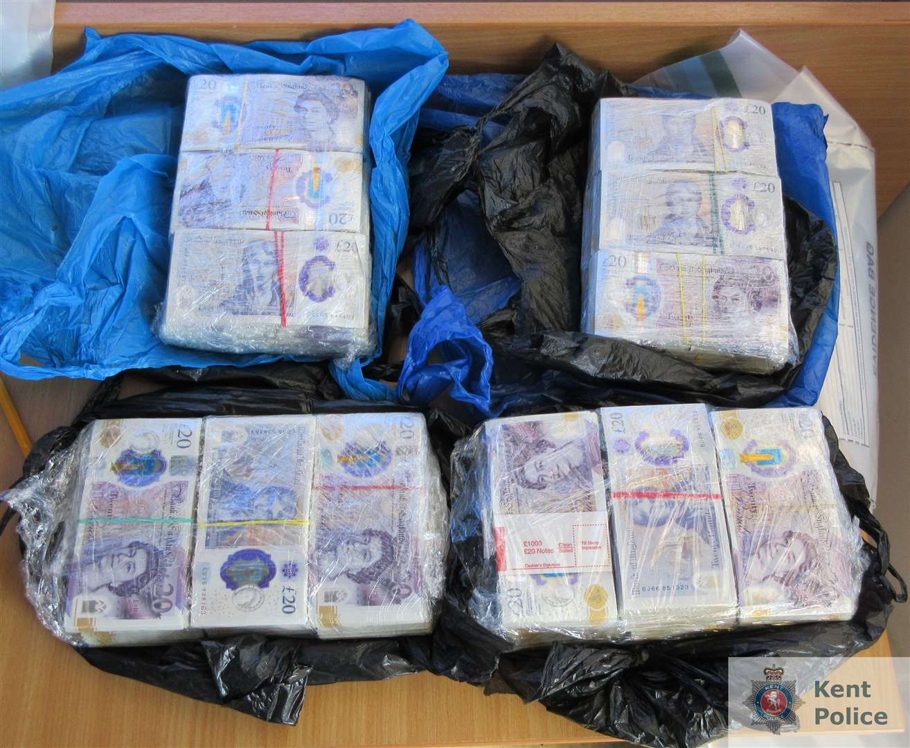 Some of the seized cash from the cars, which had been stopped at Channel Tunnel in Folkestone. Picture: Kent Police