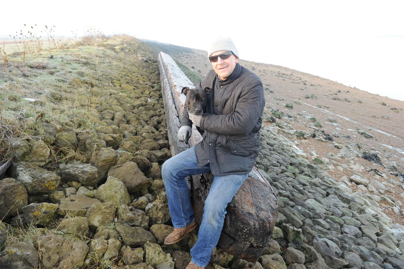 Land beside River Thames between Police training centre and fort near Higham.Christopher Head with 65ft long pylon and dog Alfie Moon.Picture: Steve Crispe FM4648001 (5378564)