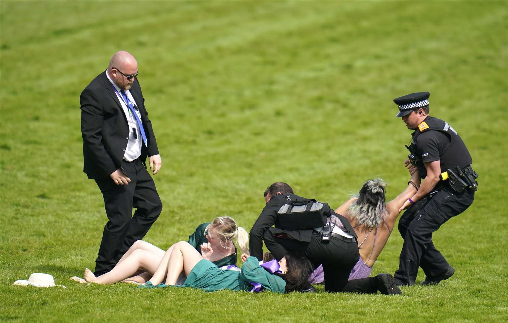 They were swiftly moved by police (Andrew Matthews/PA)