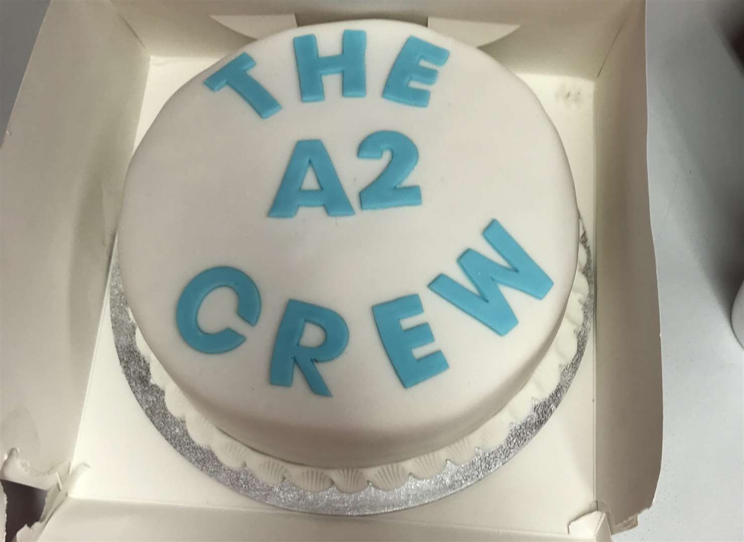 The crew's help was appreciated with a cake