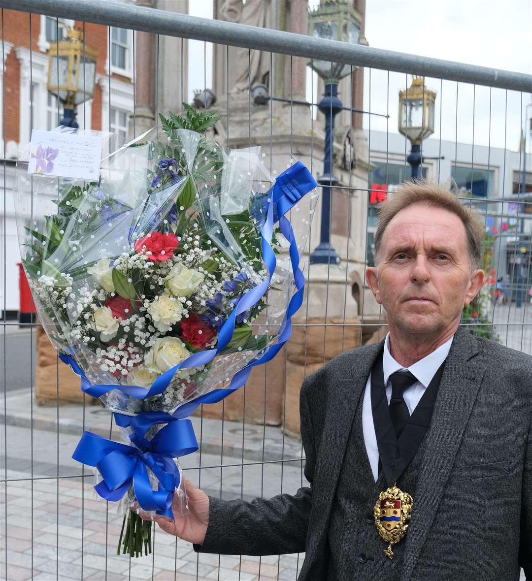 Cllr Derek Mortimer, Mayor of Maidstone, laying flowers for the Queen