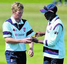 Adam Ball and Daniel Bell-Drumond talk tactics against the Netherlands. Ball took 2-32 as the Netherlands made 199-6