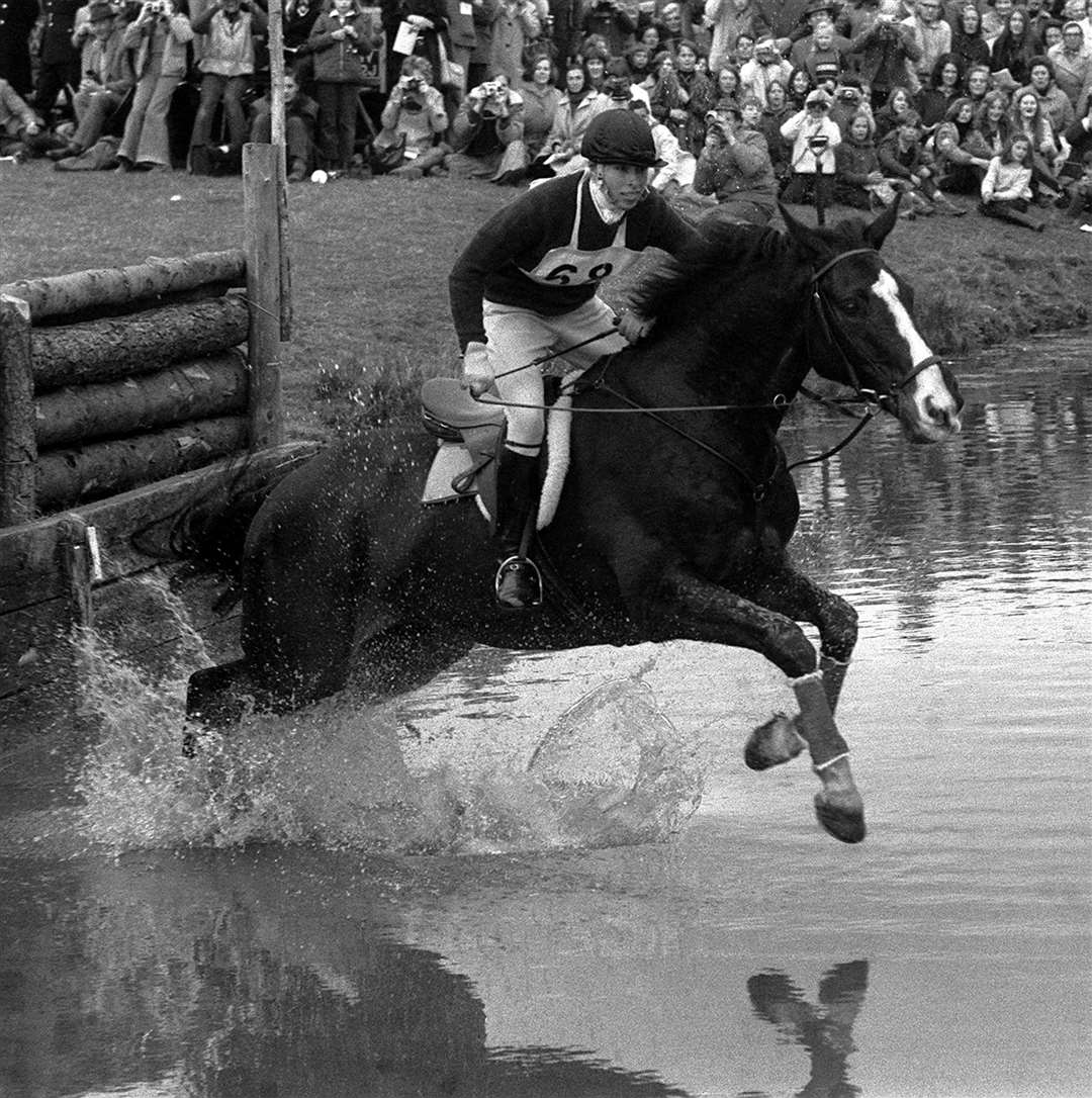 The princess taking the water-jump at the Badminton Horse Trials in 1973 (PA)