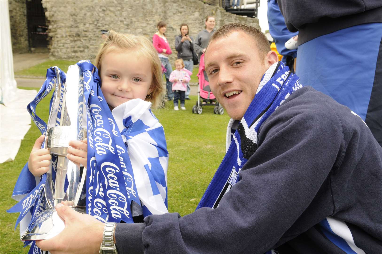 Barry Fuller pictured with daughter Gracie, then aged four, at Rochester Castle during their play-off celebrations