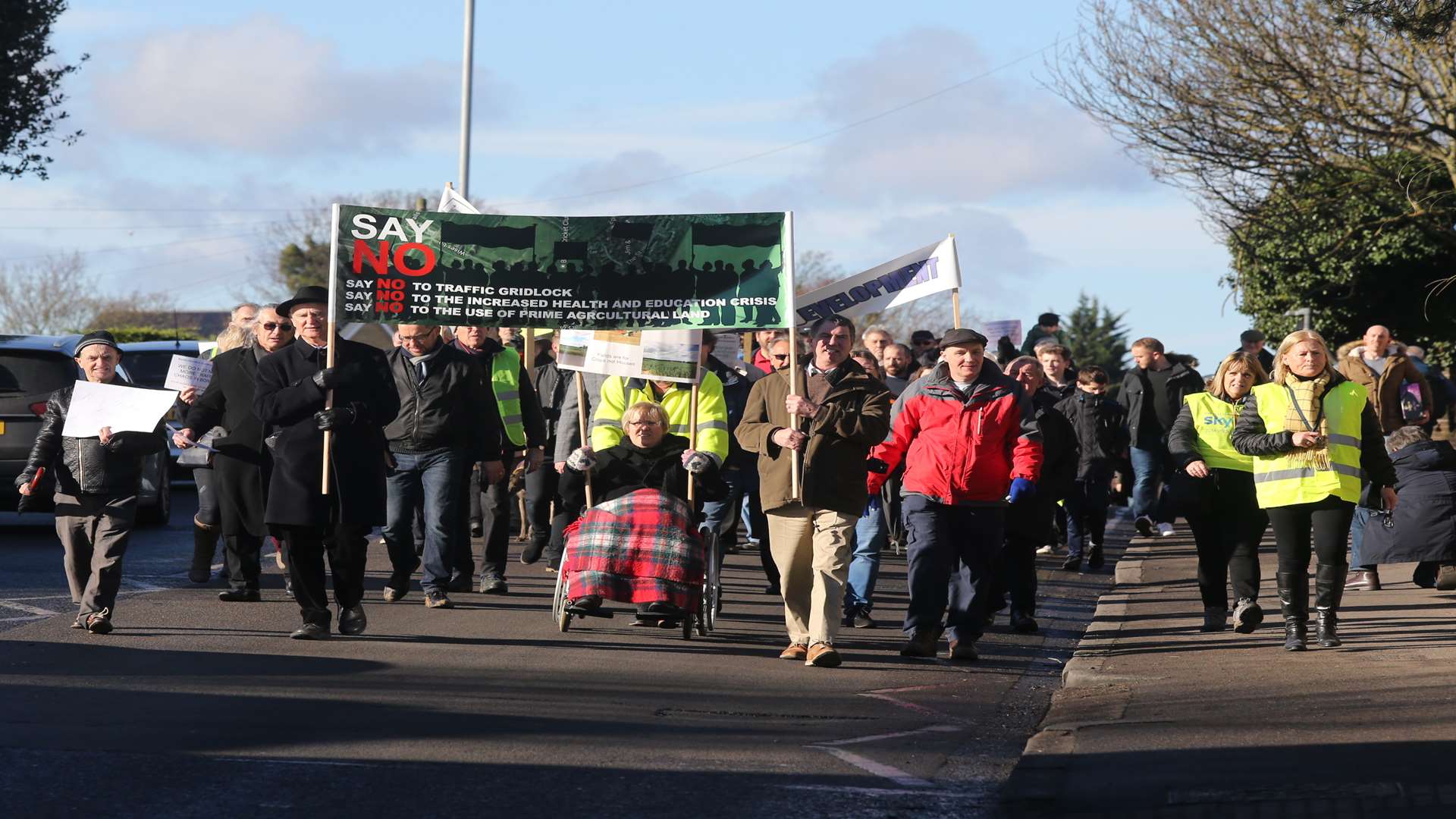 Borden Residents and councillors against development with placards during a protest march against housing plans from Borden village to Sittingbourne