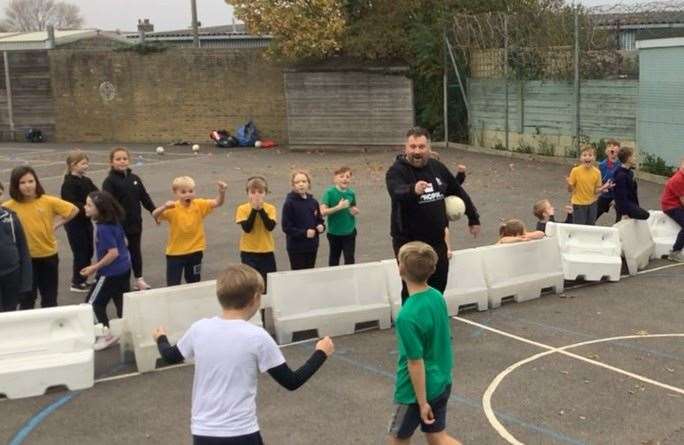 Deal Town FC first-team manager Steve King undertaking a session at the town's Sandown School last Tuesday