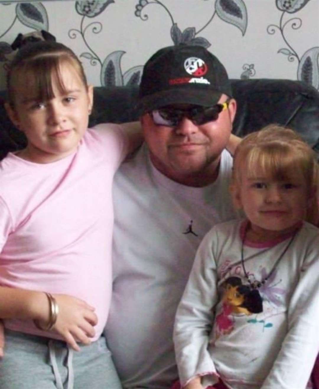 His daughter Courtney Coman (right) is now 17 and Chelsea Coman is 20 (Family handout/PA)