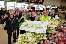 The mayor and mayoress of Swale, Cllrs Ben Stokes and Sylvia Bennett, with Natalie and Oliver Smith and staff from Asda at the £2,000 cheque presentation