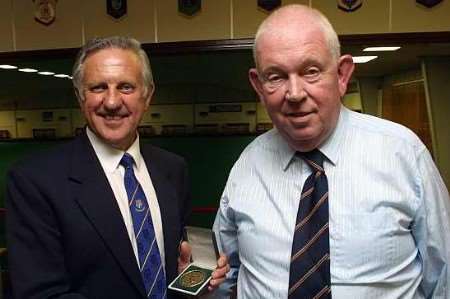 CONGRATULATIONS: Ron Kite, left, receives his award from Colin Boswell