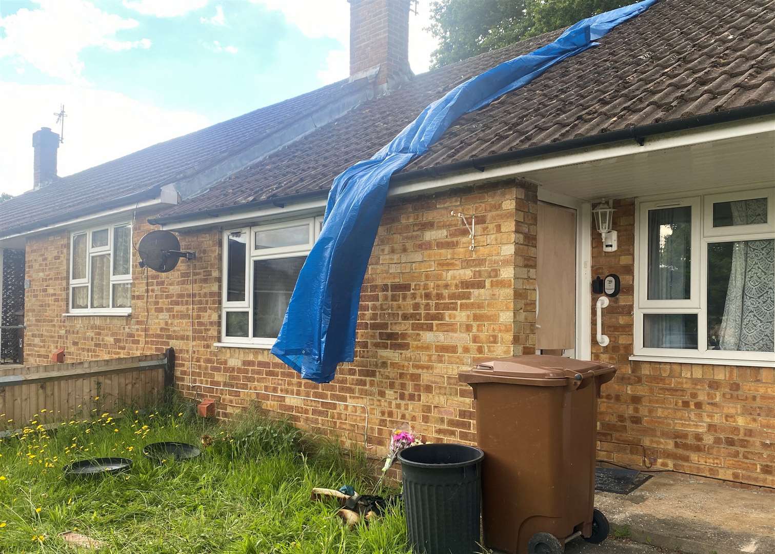 Tarpaulin has been erected and the door blocked off to the property in Sharon Crescent, Walderslade