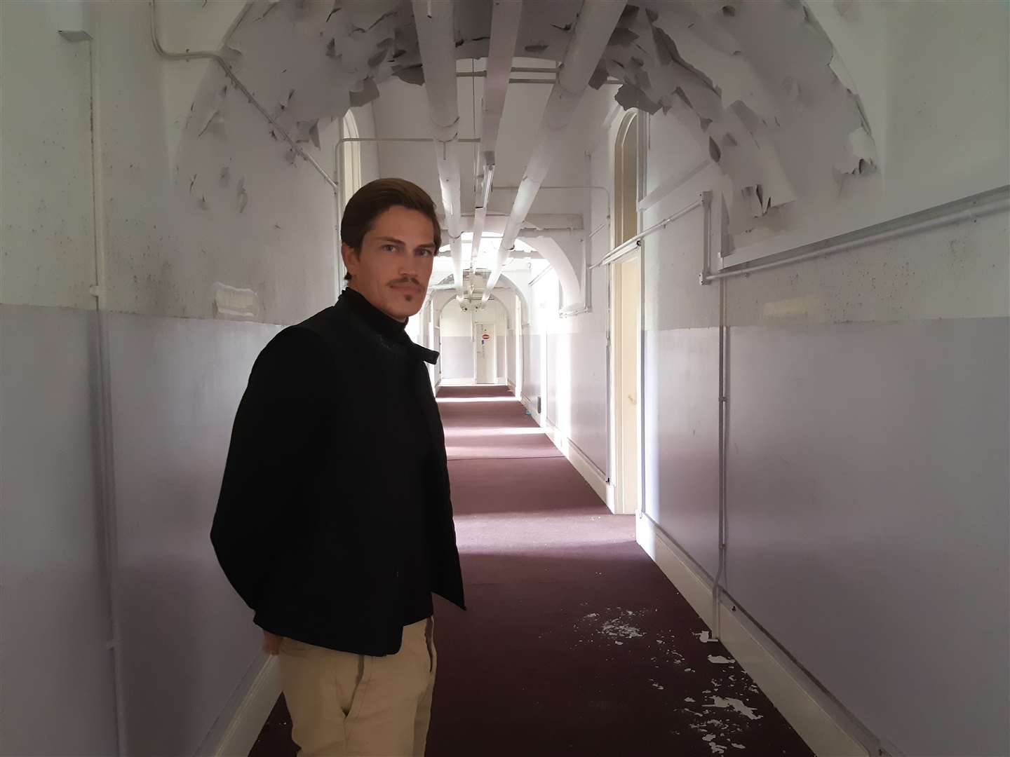 David de Min in one of the hallways of the officers' mess. Picture: Sam Lennon KMG