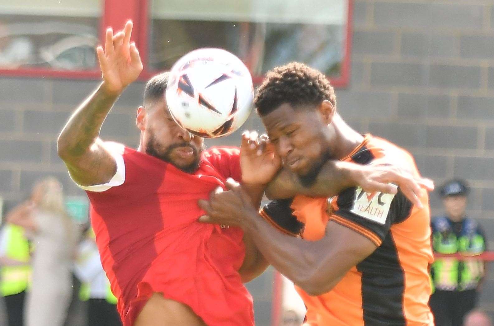 Ebbsfleet challenge for the ball in the air against Barnet defender Ade Oluwu during the Fleet’s 2-1 National League loss on Saturday. Picture: Ed Miller/EUFC