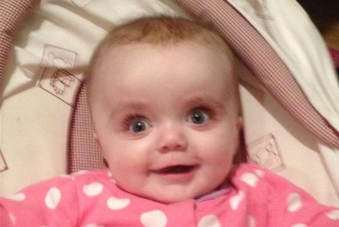 Baby Amelia Harrington who has been diagnosed with a rare brain tumour