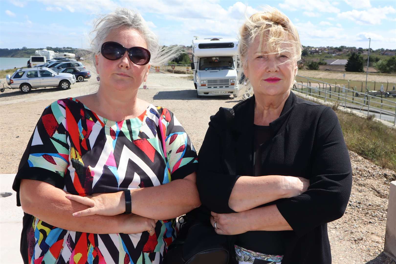 Seething sisters Michaela James and Antoinette Phillips from Medway on shingle bank at Minster, Sheppey. Picture: John Nurden