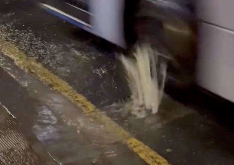 A bus drove over the burst water main in Preston Street, Faversham. Picture: Oscar's Bakery