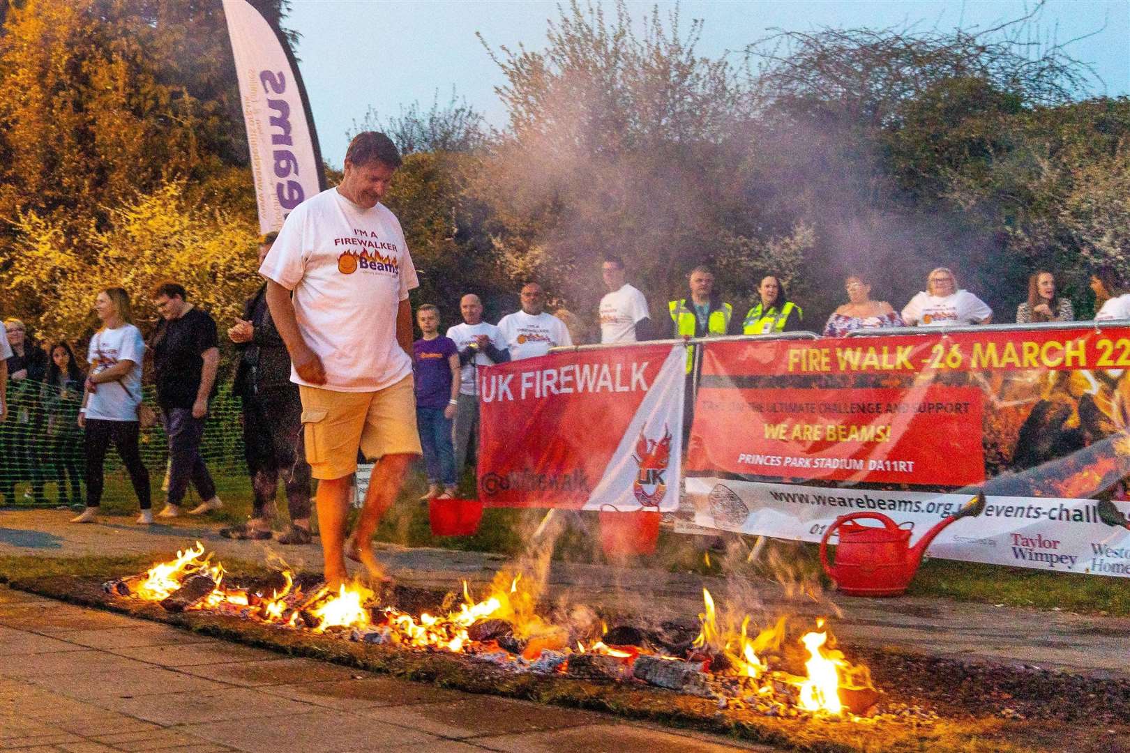 Many people walked over burning coals. Pictures: Pete Bresser