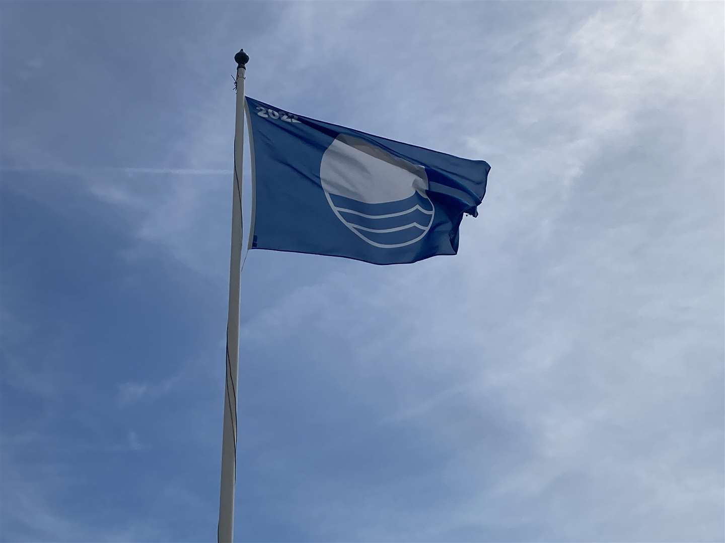 A Blue Flag flying over Sheerness beach