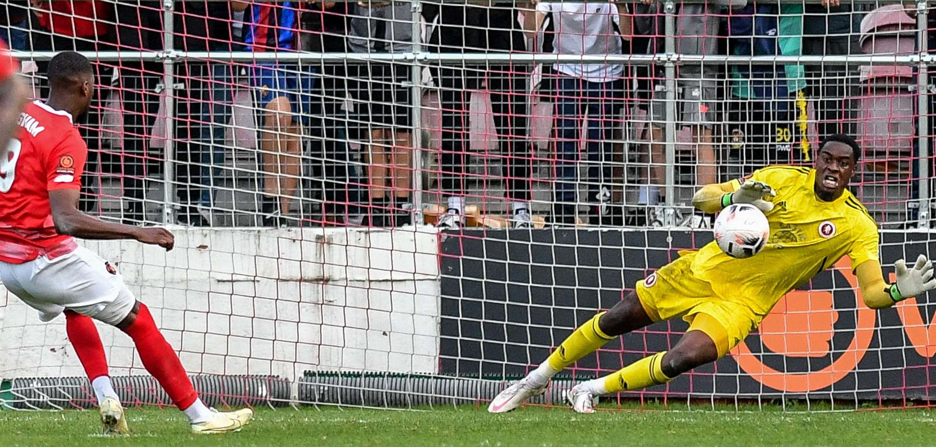 Rakish Bingham's penalty is saved by Kai McKenzie-Lyle. Picture: Dave Budden