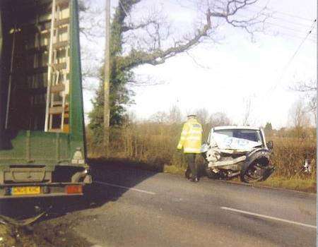 The force of the crash knocked out the Glass Services lorry's brakes and steering, causing it to smash into a garage forecourt