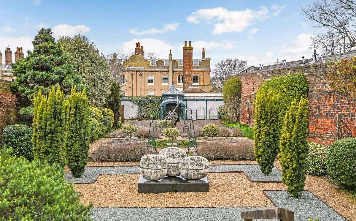 The stunning walled garden is filled with lavender beds, climbing roses, evergreen shrubs and apricot trees. Picture: Savills