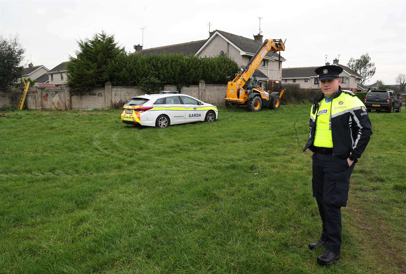 A Garda officer in Drogheda, where police carried out a forensic search in relation to the disappearance of Kyran Durnin (Damien Eagers/PA)