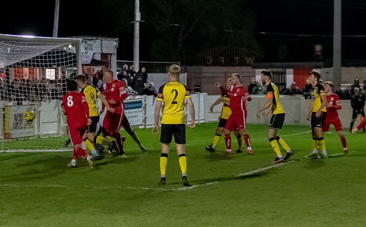 The ball then appeared to hit an away player before falling over the line. Picture: Les Biggs