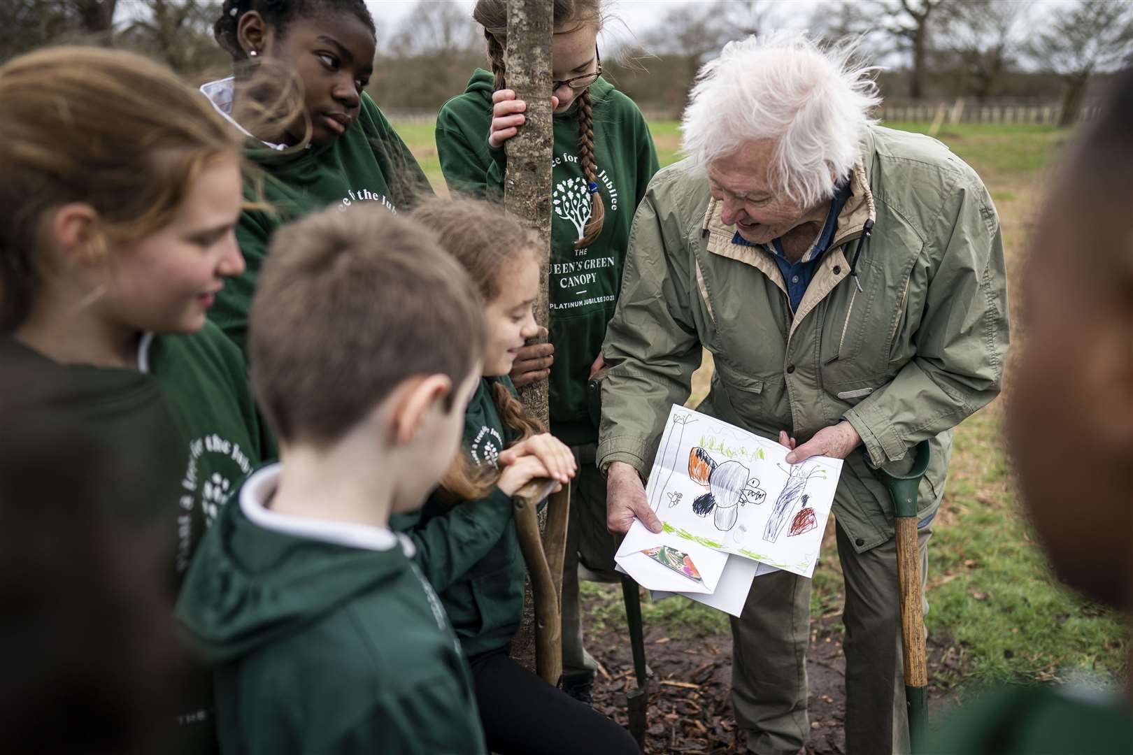 Sir David with the youngsters (Aaron Chown/PA)