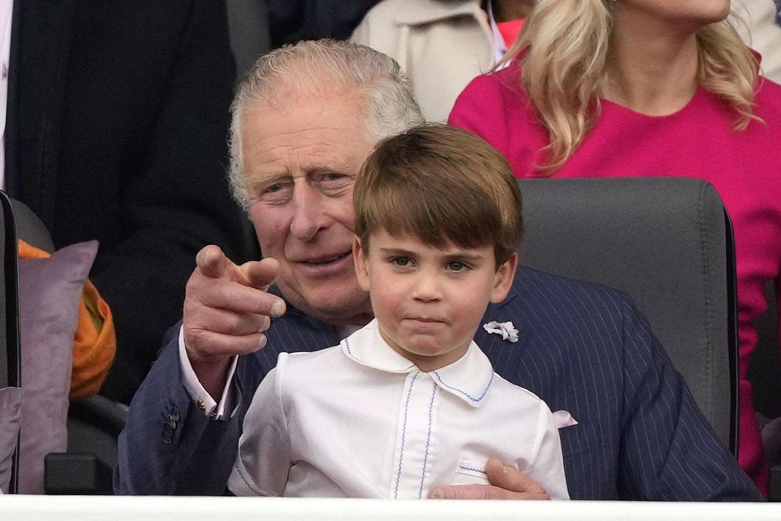 Prince Louis with his grandfather, now the King, during the Platinum Jubilee Pageant in June (PA)