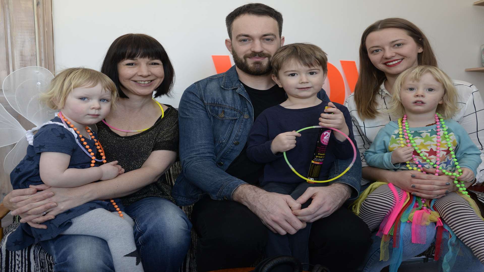 Jo Jell and Evie, two, DJ Ben Macklin and Felix, four, with stylist Hannah Bullivant, and Frankie, two. Picture: Chris Davey