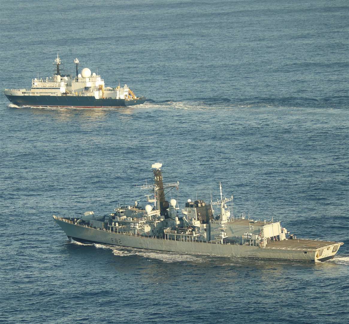 HMS Somerset (foreground) shadowing the Russian ship Yantar